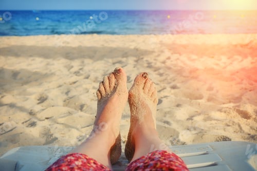 Preview: Seascape On The Background Of The Female Foot. A Woman In A Red Dress Near The Water By The Ocean