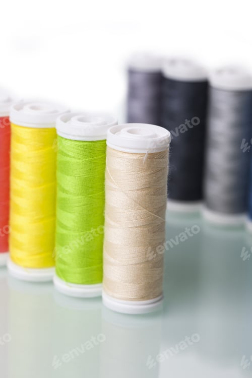 Preview: Sewing Threads Isolated On White Background. Studio Shot