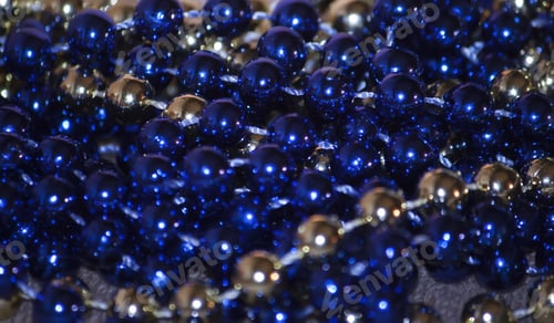 Preview: Blue And Golden Beads Close Up