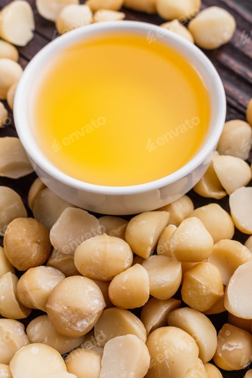 Preview: Delicious Macadamia Nuts On A Wooden Rustic Background