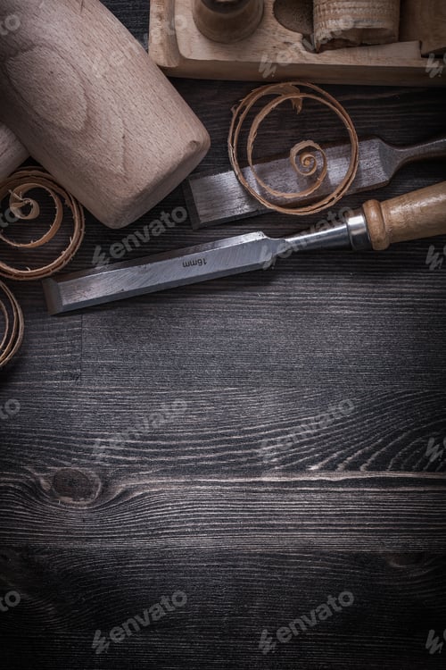 Preview: Chisels Shaving Plane Wooden Shavings Mallet On Wood Board.