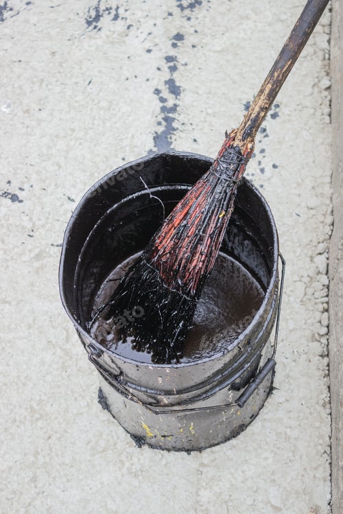 Preview: Bitumen Emulsion (Tack Coats) In Metal Bucket. Tack Coat Is A Browny-Black Emulsion Of Bitumen That