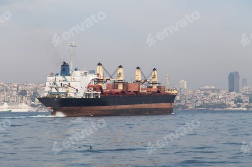 Preview: A Cargo Ship Carrying Goods Between Ports