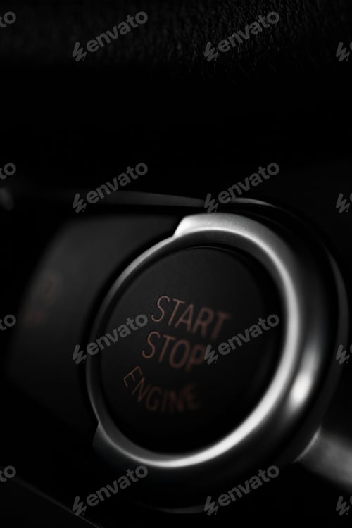 Preview: Detail On A Black Start Button In A Car.