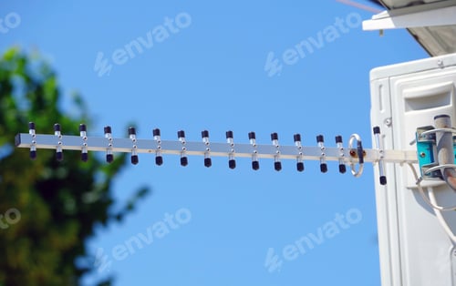 Preview: Modern Tv Antenna Against The Blue Sky