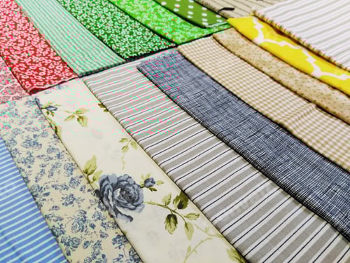 Preview: Colorful Fabric Samples Displayed in Neat Diagonal Rows