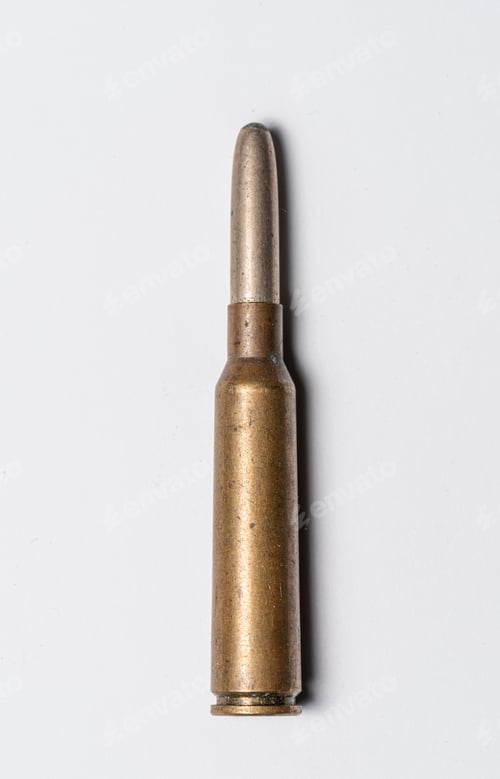 Preview: Old Rifle Bullet From The 1950S On White Background.