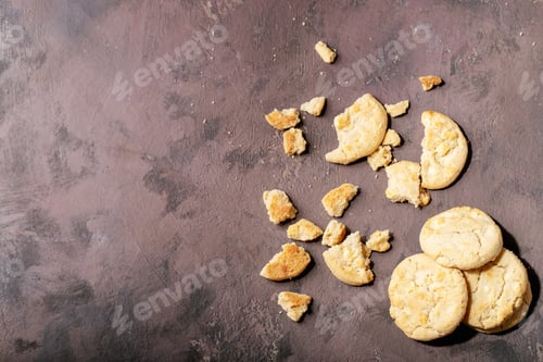 Preview: Homemade White Chocolate Chunk Cookies Over Brown Texture Background. Top View, Flat Lay. Copy Space
