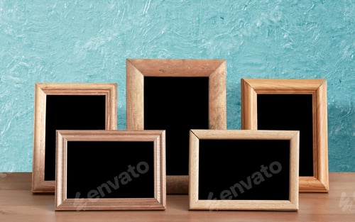 Preview: Wooden Photo Frames On Table, Blue Wall