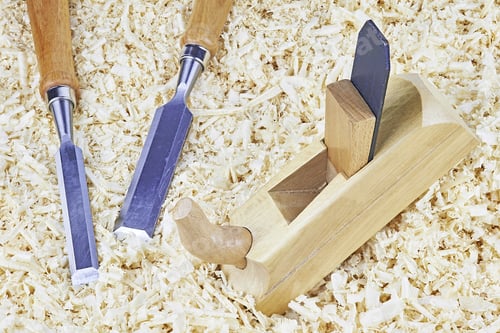 Preview: Two Chisels And One Spokeshave Lying In Wooden Shavings