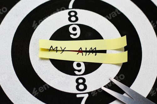 Preview: The Inscription On The Sticker: "My Aim" Cut In Half Against The Background Of The Target For
