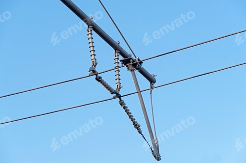Preview: Contact Wires Of A Trolley Bus Against A Blue Sky