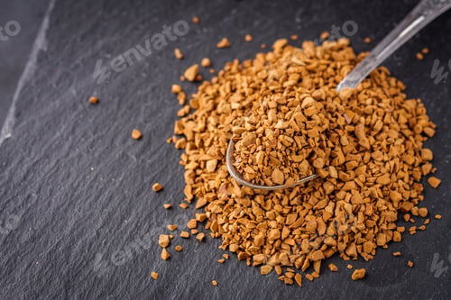 Preview: Instant Coffee Granules On A Dark Stone Background
