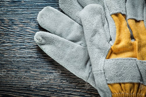 Preview: Working Gloves On Wooden Board Top View.