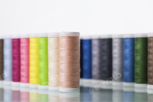 Preview: Sewing Threads Isolated On White Background. Studio Shot