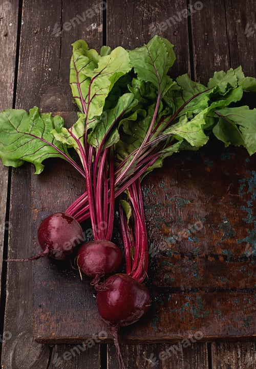 Preview: Beetroot With Leaves Over A Rustic Wooden Board