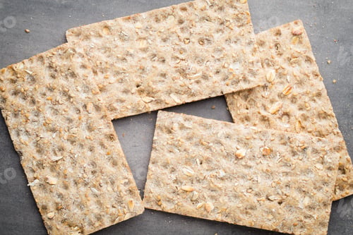 Preview: Stack Of Wholegrain Crispy Bread With Sunflower, Chia And Sesames Seeds
