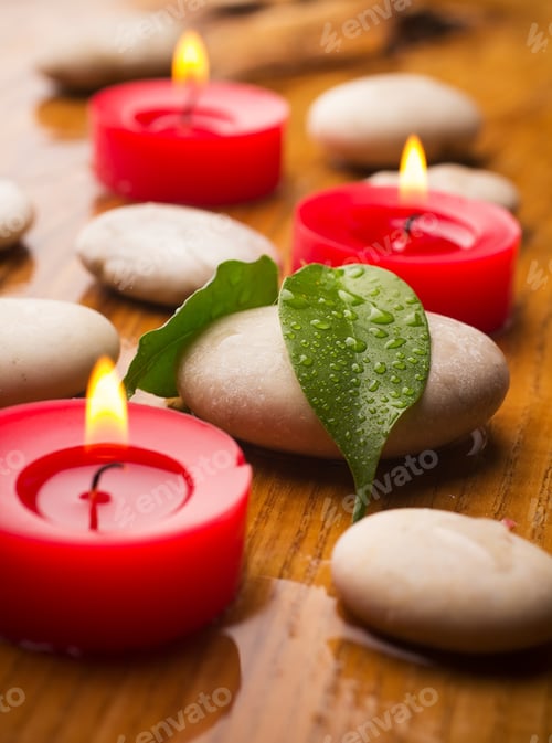 Preview: Massage Stones With Green Leaves And Water Drops. Wood Background.