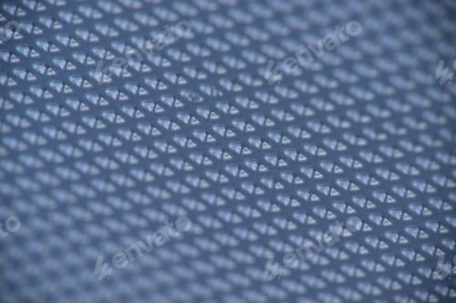Preview: Perforated Metal Sheet On Dark Blue Background