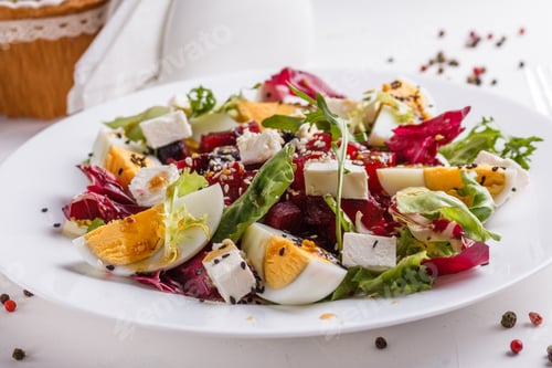 Preview: Fresh Mixed Salad In A Bowl On A White Background