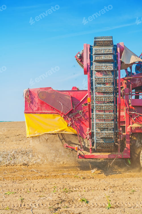 Preview: Potato Harvester In Work On Field Very Cllose Up