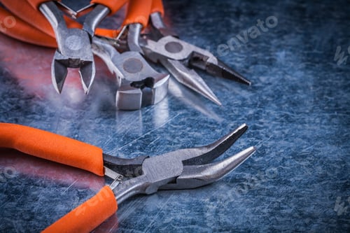 Preview: Insulated Electric Nippers Gripping Tongs With Rubber Handles Electricity Concept.