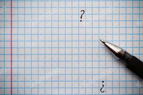 Preview: The Inscription With A Pen: "?" Question Mark On A Sheet Of Squared Notebook, Background