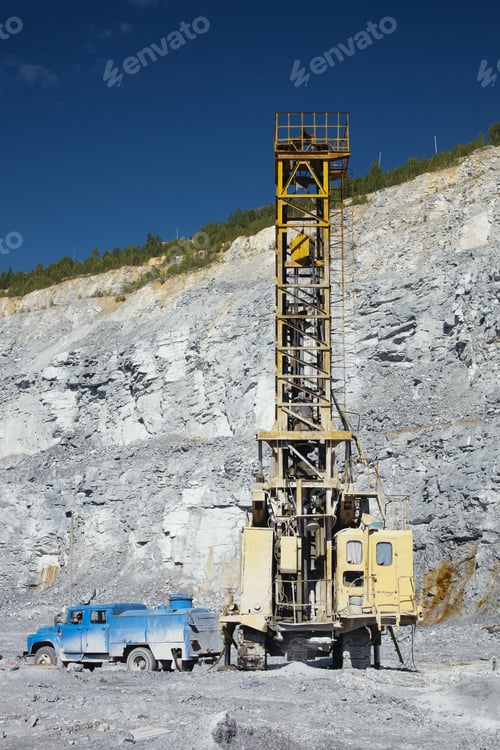 Preview: Quarry Drilling Machine In The Quarry. Refilling With Water From A Tank Truck. Quarry Equipment