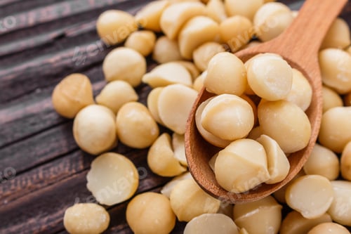 Preview: Delicious Macadamia Nuts On A Wooden Rustic Background