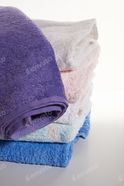 Preview: Stack Of Colored Towels On A White Background