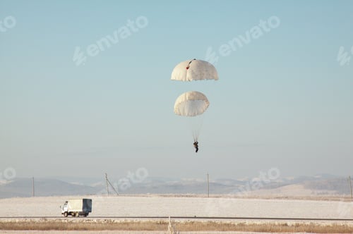 Preview: Landing A Skydiver Under The Main And Reserve Parachutes.
