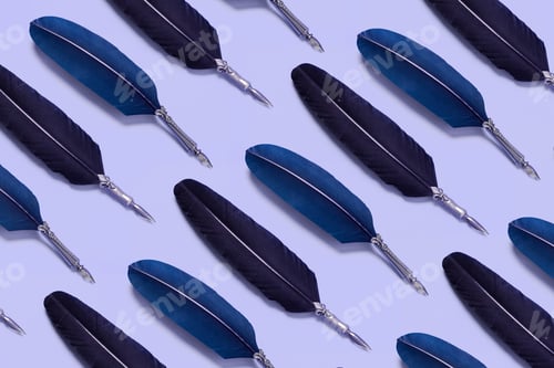 Preview: Blue Quill Pens Organized In A Row Over Blue Background