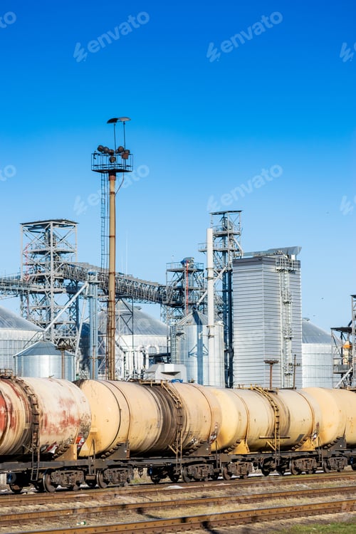 Preview: Elevator Silos With The Railway Station And Fuel Cars Vertical