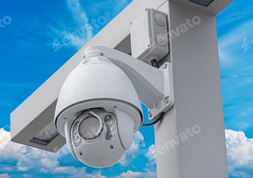 Preview: Ip Security Camera And Led Street Lantern Mounted On Post Against The Blue Sky