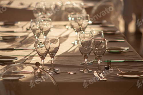 Preview: Table Set With Glasses At The Sea At Sunset
