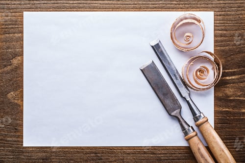 Preview: Clean Sheet Of Paper Wooden Shavings Flat Chisels Construction Concept.