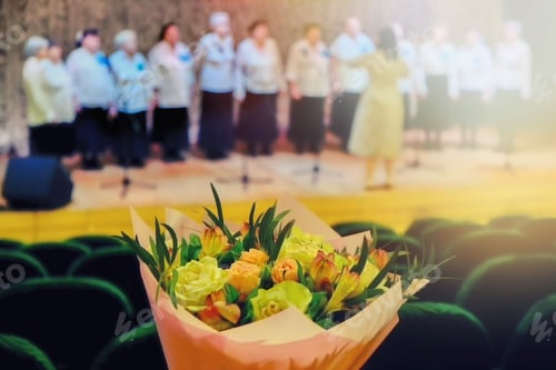 Preview: Beautiful Flowers For The Singer On Stage. Bouquet Of Roses For Singer And Musician. Roses For