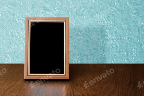 Preview: Wooden Photo Frame On Table, Blue Wall
