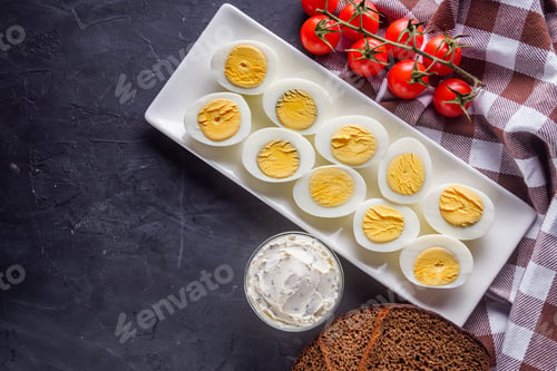 Preview: Boiled Chicken Eggs On A Dark Stone Background
