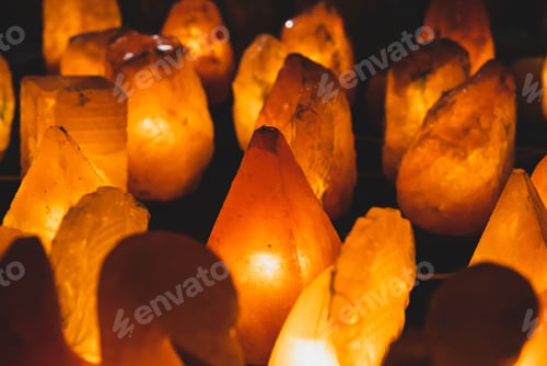Preview: Full Frame Of Large Group Of Orange Light Salt Lamps For Sale In Shop