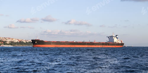 Preview: A Cargo Ship Carrying Goods Between Ports