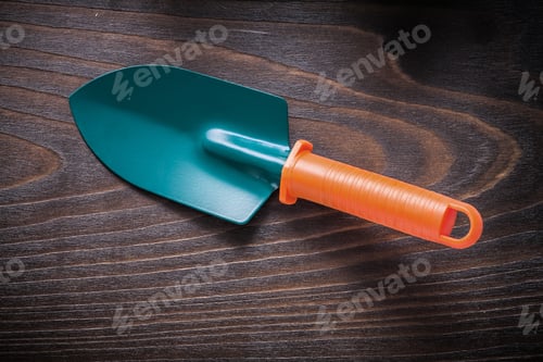 Preview: Hand Gardening Spade On Vintage Wood Board Agriculture Concept.
