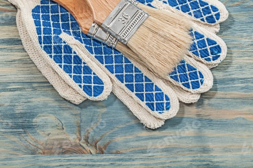 Preview: Paintbrushes Protective Gloves On Wooden Board Construction Concept.