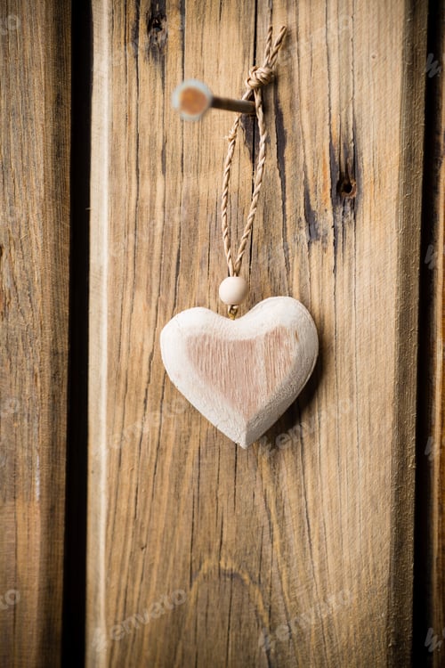 Preview: Heart Hanging On Nails, Wooden Texture Background. Studio Photo.