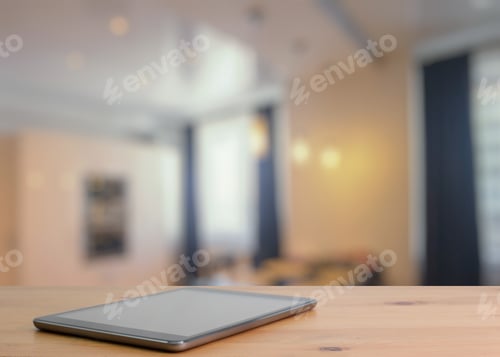 Preview: Tablet On Wooden Table In The Living Room