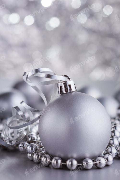Preview: Christmas Composition Of Christmas Tree Toys On A Blurred Silver Background