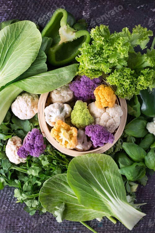 Preview: Organic Rainbow Cauliflower With Various Greens: Bok Choi, Lettuce, Bell Pepper, Basil And Parsley