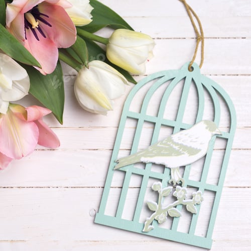 Preview: Fresh White And Pink Tulips And Decorative Bird Cage On White Painted Wooden Background. Selective