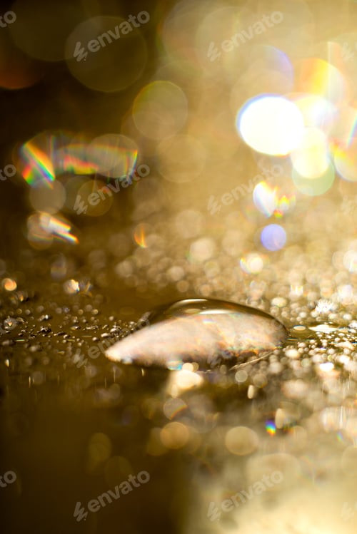 Preview: Yellow Cooking Oil Bubble And Drops On Water For Background.