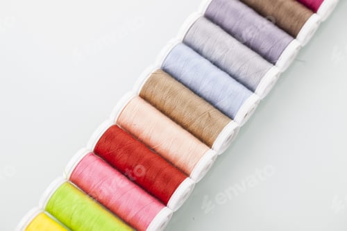 Preview: Sewing Threads Isolated On White Background. Studio Shot